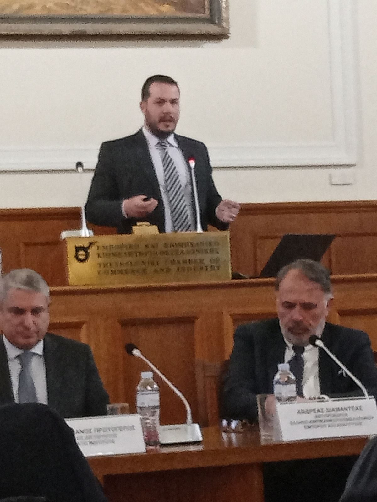 John Kourkoutas speaking at a chamber of commerce event